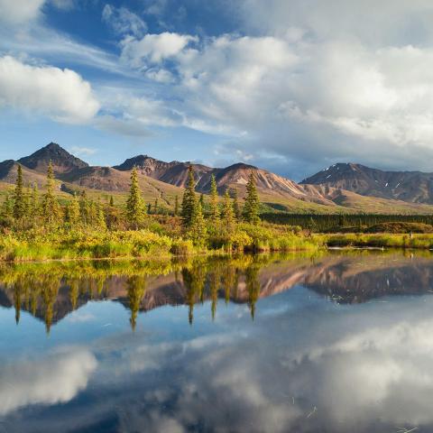 Evening photo tour, reflective lake