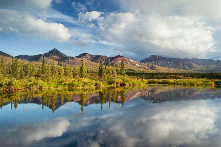 Evening photo tour, reflective lake