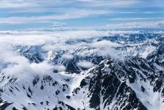 A bird's eye view of a snowy mountain range
