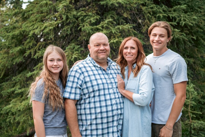 a group of people posing for the camera